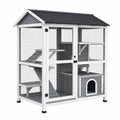 Enclos extérieur pour chat Kerlixon en bois gris blanc avec toit, plateformes et dimensions 99x52x130 cm.